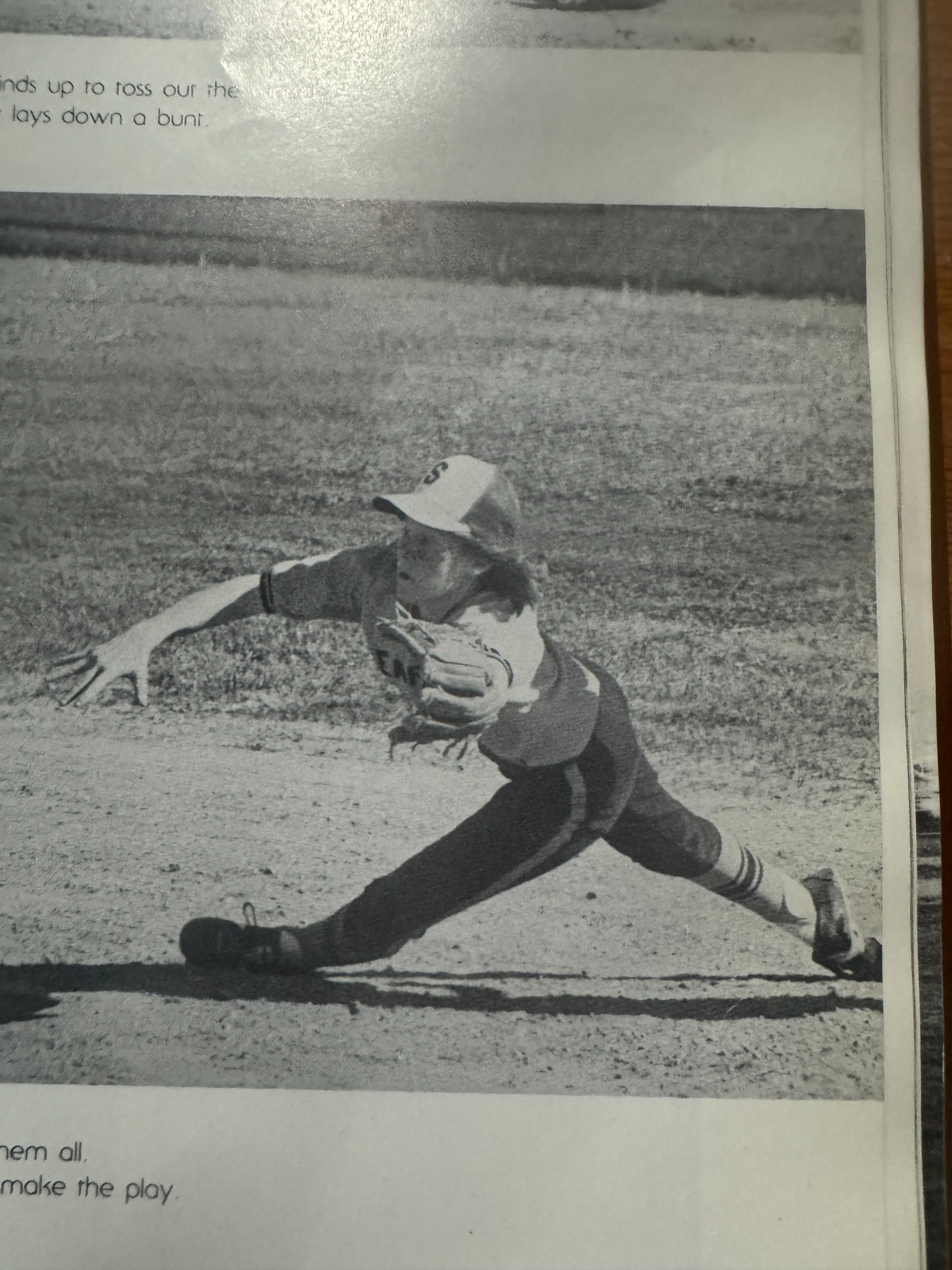 Seaford softball player reaching for the ball in a yearbook photograph.