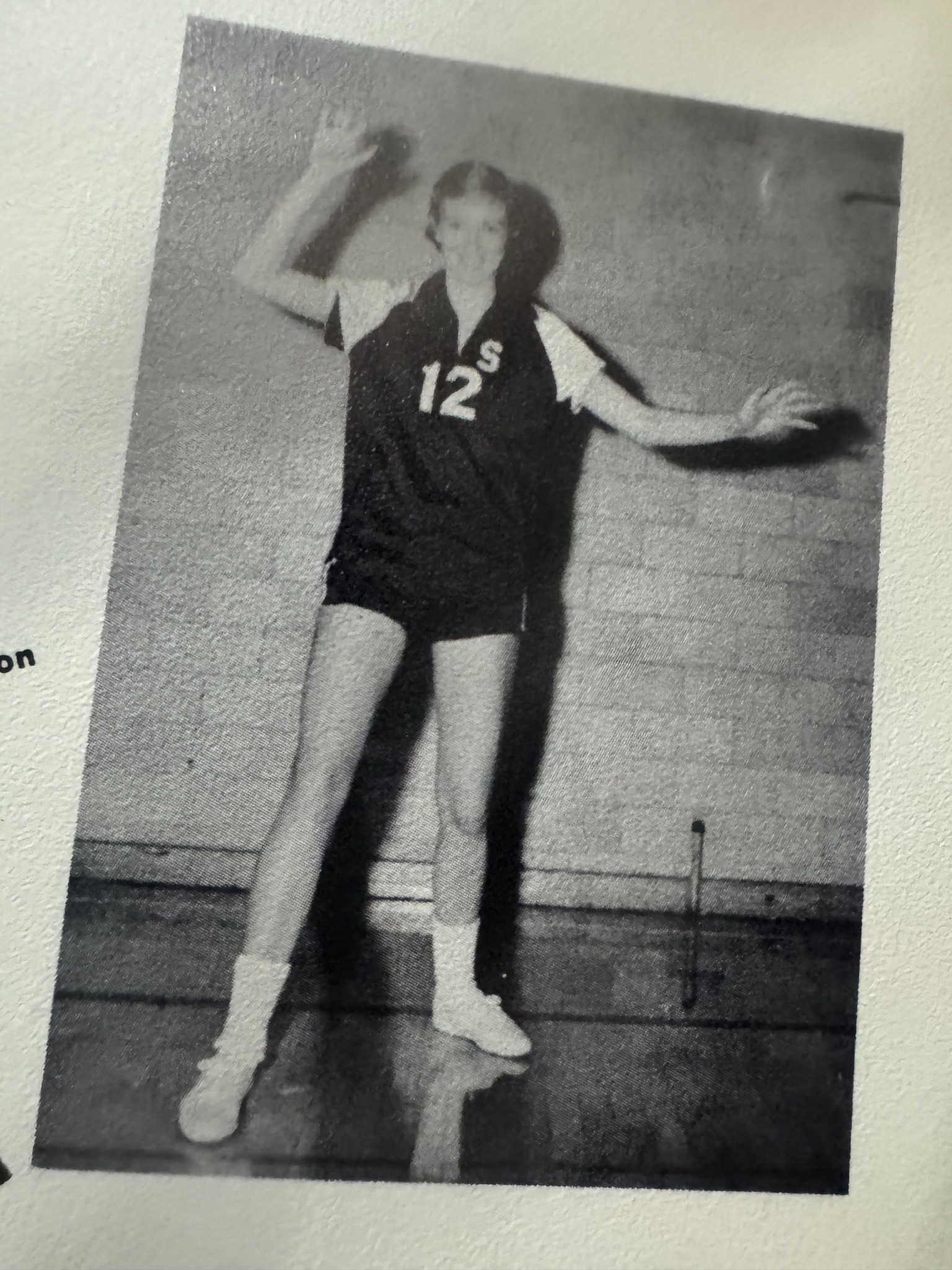 Seaford volleyball player preparing to serve in a yearbook photograph.